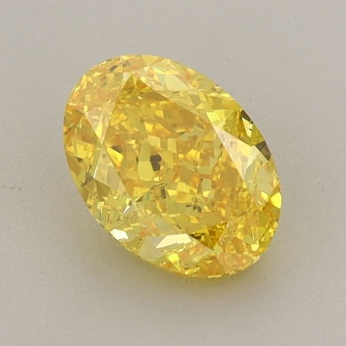 Loose Diamond - OVAL 1.04ct Fancy Vivid Yellow VS1: Loose Diamond - OVAL 1.04ct Fancy Vivid Yellow VS1 Source: This is a real non-mined Diamond that has been grown in a lab Shape: OVAL Carats: 1.04 Color: Fancy Vivid Yellow Certification: IGI The Diamo