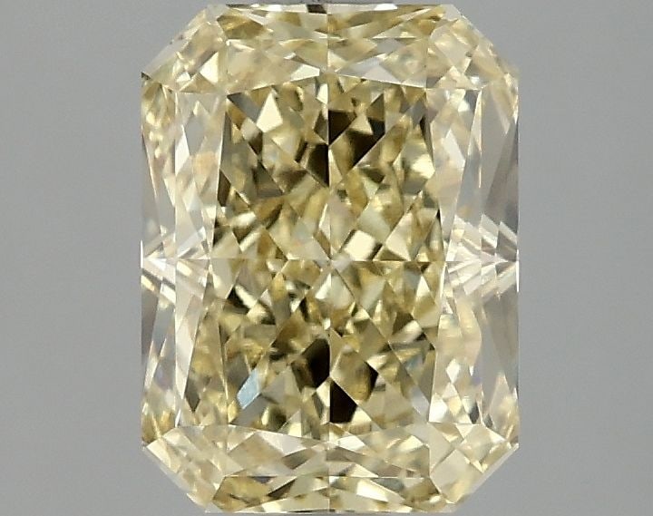 Loose Diamond - RADIANT 2.07ct Fancy Vivid Yellow VS1: Loose Diamond - RADIANT 2.07ct Fancy Vivid Yellow VS1 Source: This is a real non-mined Diamond that has been grown in a lab Shape: RADIANT Carats: 2.07 Color: Fancy Vivid Yellow Certification: IGI Vid