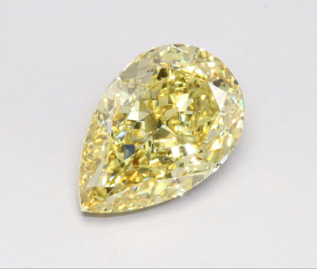 Loose Diamond - PEAR 5.02ct Fancy Vivid Yellow VS1: Loose Diamond - PEAR 5.02ct Fancy Vivid Yellow VS1 Source: This is a real non-mined Diamond that has been grown in a lab Shape: PEAR Carats: 5.02 Color: Fancy Vivid Yellow Certification: IGI Video: