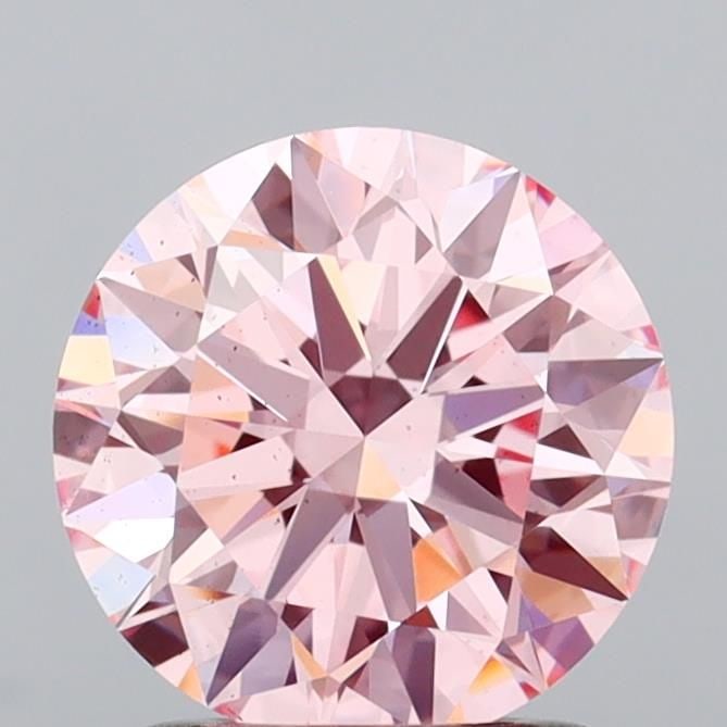 Ideal Loose Diamond - ROUND 1.51ct Fancy Vivid Pink VS2: Ideal Loose Diamond - ROUND 1.51ct Fancy Vivid Pink VS2 Source: This is a real non-mined Diamond that has been grown in a lab Shape: ROUND Carats: 1.51 Color: Fancy Vivid Pink Certification: IGI Video