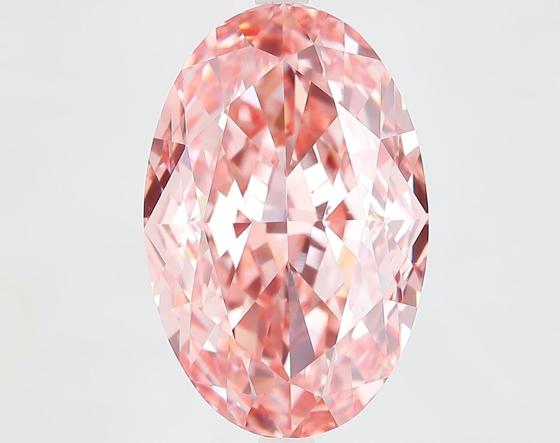 Loose Diamond - OVAL 11.55ct Fancy Vivid Pink VS1: Loose Diamond - OVAL 11.55ct Fancy Vivid Pink VS1 Source: This is a real non-mined Diamond that has been grown in a lab Shape: OVAL Carats: 11.55 Color: Fancy Vivid Pink Certification: IGI Video: