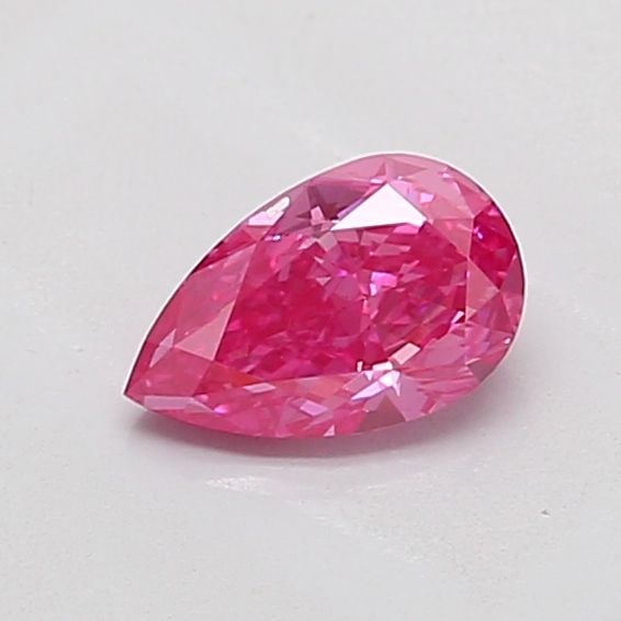 Loose Diamond - PEAR 0.75ct Fancy Vivid Pink VS2: Loose Diamond - PEAR 0.75ct Fancy Vivid Pink VS2 Source: This is a real non-mined Diamond that has been grown in a lab Shape: PEAR Carats: 0.75 Color: Fancy Vivid Pink Certification: IGI Video: