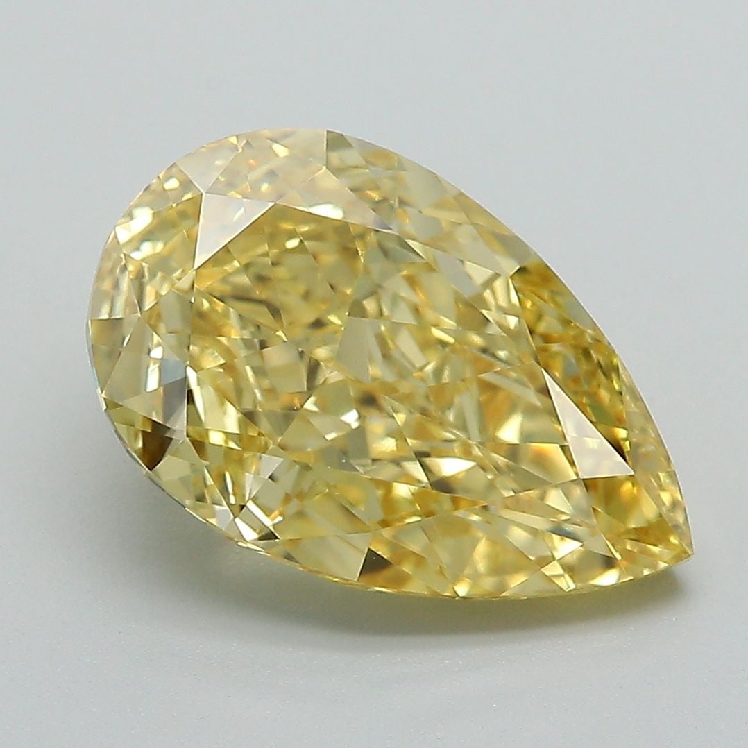 Loose Diamond - PEAR 4.52ct Fancy Vivid Yellow VVS2: Loose Diamond - PEAR 4.52ct Fancy Vivid Yellow VVS2 Source: This is a real non-mined Diamond that has been grown in a lab Shape: PEAR Carats: 4.52 Color: Fancy Vivid Yellow Certification: IGI Video: