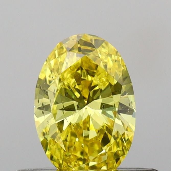 Loose Diamond - OVAL 0.46ct Fancy Vivid Yellow SI1: Loose Diamond - OVAL 0.46ct Fancy Vivid Yellow SI1 Source: This is a real non-mined Diamond that has been grown in a lab Shape: OVAL Carats: 0.46 Color: Fancy Vivid Yellow Certification: IGI Video: