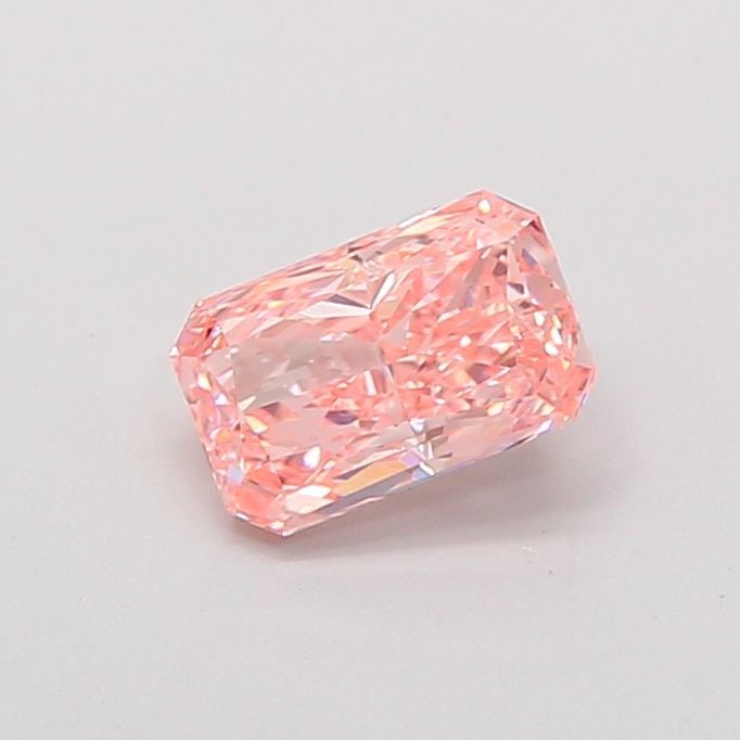 Loose Diamond - RADIANT 0.91ct Fancy Vivid Pink VVS2: Loose Diamond - RADIANT 0.91ct Fancy Vivid Pink VVS2 Source: This is a real non-mined Diamond that has been grown in a lab Shape: RADIANT Carats: 0.91 Color: Fancy Vivid Pink Certification: IGI Video: