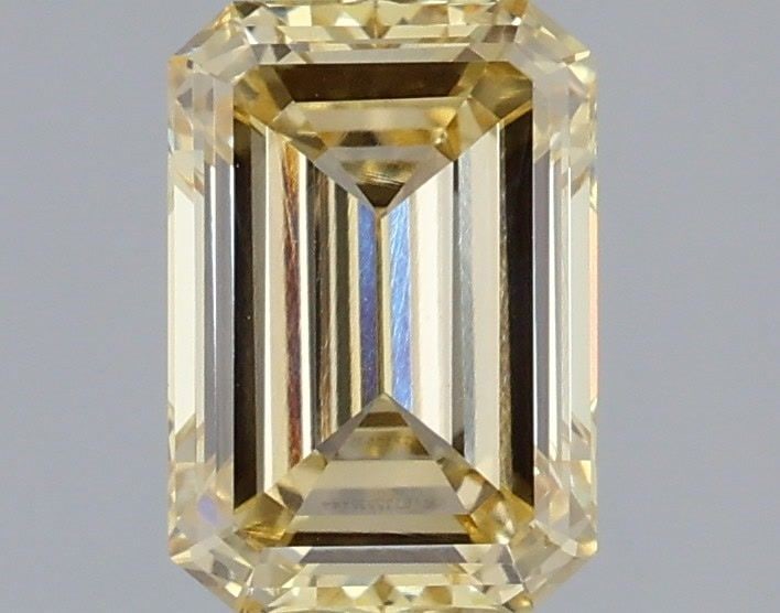 Loose Diamond - EMERALD 1.52ct Fancy Yellow VVS2: Loose Diamond - EMERALD 1.52ct Fancy Yellow VVS2 Source: This is a real non-mined Diamond that has been grown in a lab Shape: EMERALD Carats: 1.52 Color: Fancy Yellow Certification: IGI Video: