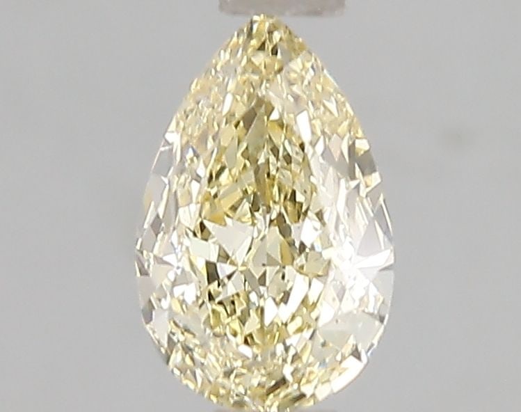 Loose Diamond - PEAR 1.07ct Fancy Yellow VS2: Loose Diamond - PEAR 1.07ct Fancy Yellow VS2 Source: This is a real non-mined Diamond that has been grown in a lab Shape: PEAR Carats: 1.07 Color: Fancy Yellow Certification: IGI Video: