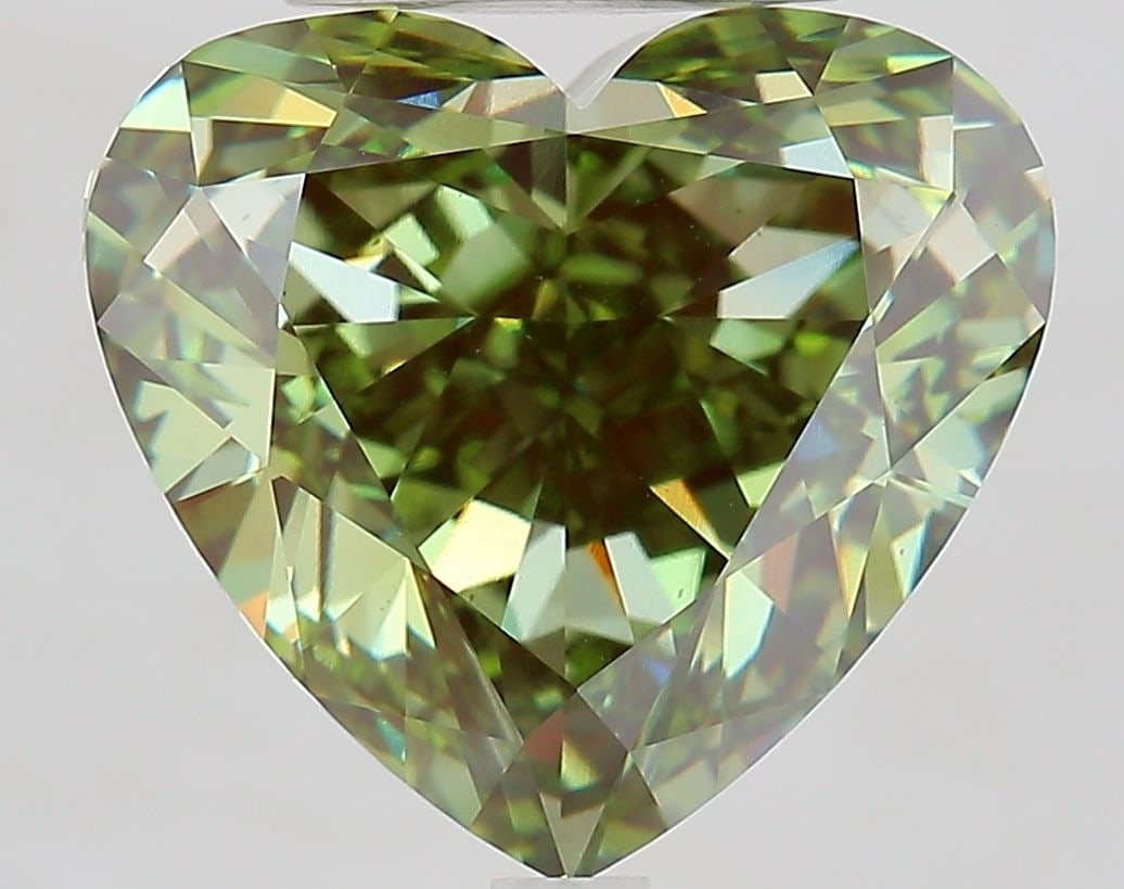 Loose Diamond - HEART 8.81ct Fancy Vivid Green VS1: Loose Diamond - HEART 8.81ct Fancy Vivid Green VS1 Source: This is a real non-mined Diamond that has been grown in a lab Shape: HEART Carats: 8.81 Color: Fancy Vivid Green Certification: IGI Video: