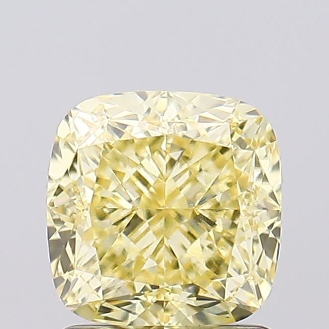 Loose Diamond - CUSHION MODIFIED 1.69ct Fancy Yellow VVS2: Loose Diamond - CUSHION MODIFIED 1.69ct Fancy Yellow VVS2 Source: This is a real non-mined Diamond that has been grown in a lab Shape: CUSHION MODIFIED Carats: 1.69 Color: Fancy Yellow Certification: 