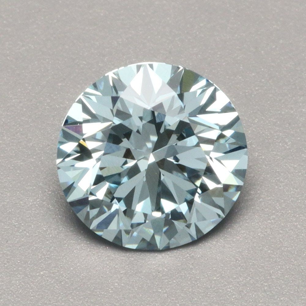 Ideal Loose Diamond - ROUND 1.02ct Fancy Vivid Blue VVS2: Ideal Loose Diamond - ROUND 1.02ct Fancy Vivid Blue VVS2 Source: This is a real non-mined Diamond that has been grown in a lab Shape: ROUND Carats: 1.02 Color: Fancy Vivid Blue Certification: IGI Vide