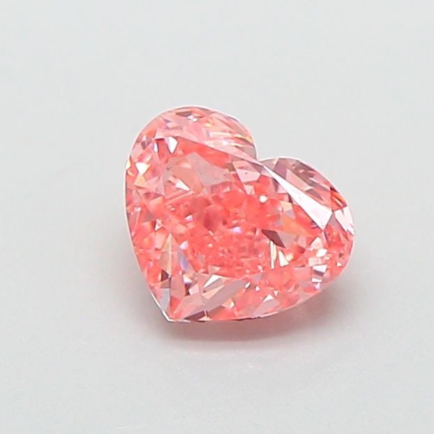 Loose Diamond - HEART 0.71ct Fancy Vivid Pink VS2: Loose Diamond - HEART 0.71ct Fancy Vivid Pink VS2 Source: This is a real non-mined Diamond that has been grown in a lab Shape: HEART Carats: 0.71 Color: Fancy Vivid Pink Certification: IGI Video: