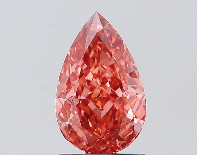 Loose Diamond - PEAR 1.59ct Fancy Vivid Pink VVS2: Loose Diamond - PEAR 1.59ct Fancy Vivid Pink VVS2 Source: This is a real non-mined Diamond that has been grown in a lab Shape: PEAR Carats: 1.59 Color: Fancy Vivid Pink Certification: IGI Video: