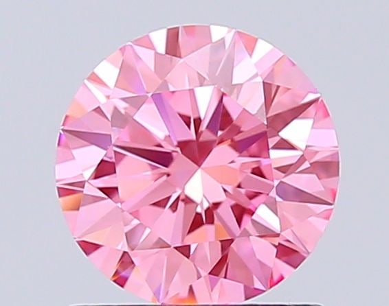 Ideal Loose Diamond - ROUND 1.05ct Fancy Vivid Pink VVS2: Ideal Loose Diamond - ROUND 1.05ct Fancy Vivid Pink VVS2 Source: This is a real non-mined Diamond that has been grown in a lab Shape: ROUND Carats: 1.05 Color: Fancy Vivid Pink Certification: IGI Vide