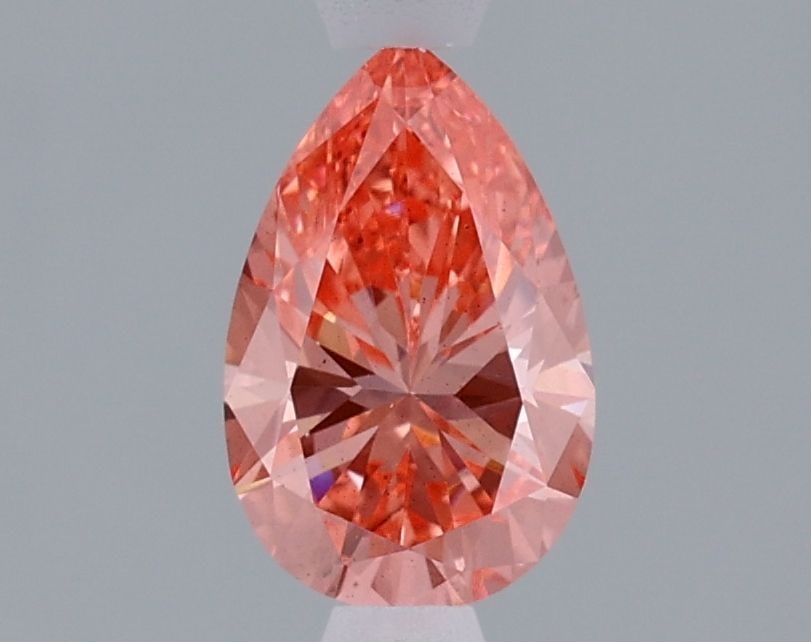 Loose Diamond - PEAR 1.01ct Fancy Vivid Pink VS2: Loose Diamond - PEAR 1.01ct Fancy Vivid Pink VS2 Source: This is a real non-mined Diamond that has been grown in a lab Shape: PEAR Carats: 1.01 Color: Fancy Vivid Pink Certification: IGI Video: