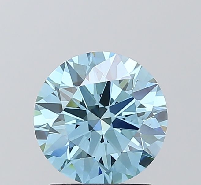 Ideal Loose Diamond - ROUND 1.59ct Fancy Vivid Blue VS1: Ideal Loose Diamond - ROUND 1.59ct Fancy Vivid Blue VS1 Source: This is a real non-mined Diamond that has been grown in a lab Shape: ROUND Carats: 1.59 Color: Fancy Vivid Blue Certification: IGI Video