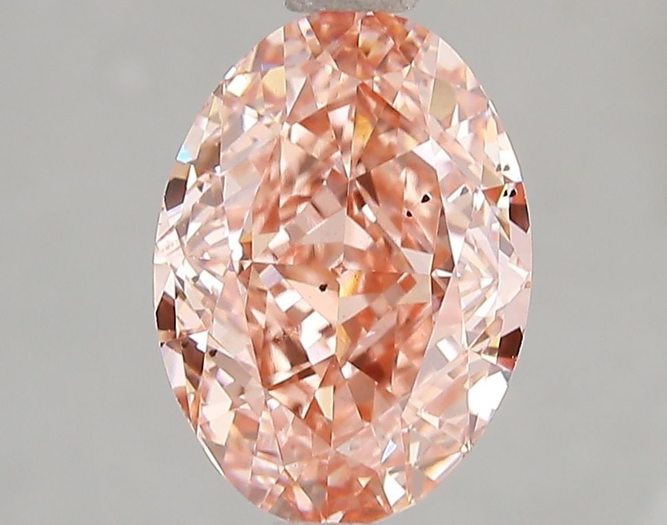 Loose Diamond - OVAL 3.09ct Fancy Vivid Pink SI1: Loose Diamond - OVAL 3.09ct Fancy Vivid Pink SI1 Source: This is a real non-mined Diamond that has been grown in a lab Shape: OVAL Carats: 3.09 Color: Fancy Vivid Pink Certification: IGI Video: