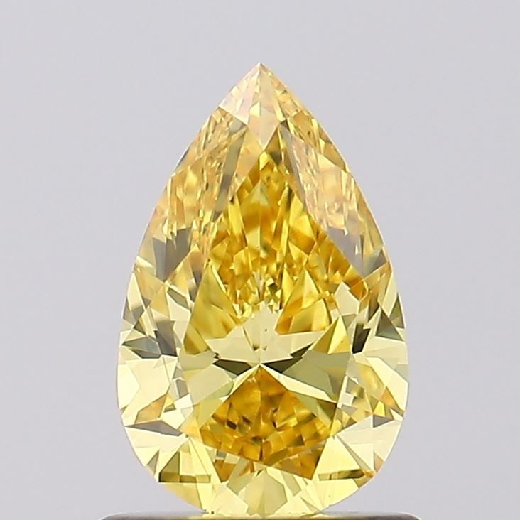Loose Diamond - PEAR 0.78ct Fancy Vivid Yellow VS1: Loose Diamond - PEAR 0.78ct Fancy Vivid Yellow VS1 Source: This is a real non-mined Diamond that has been grown in a lab Shape: PEAR Carats: 0.78 Color: Fancy Vivid Yellow Certification: IGI Video:
