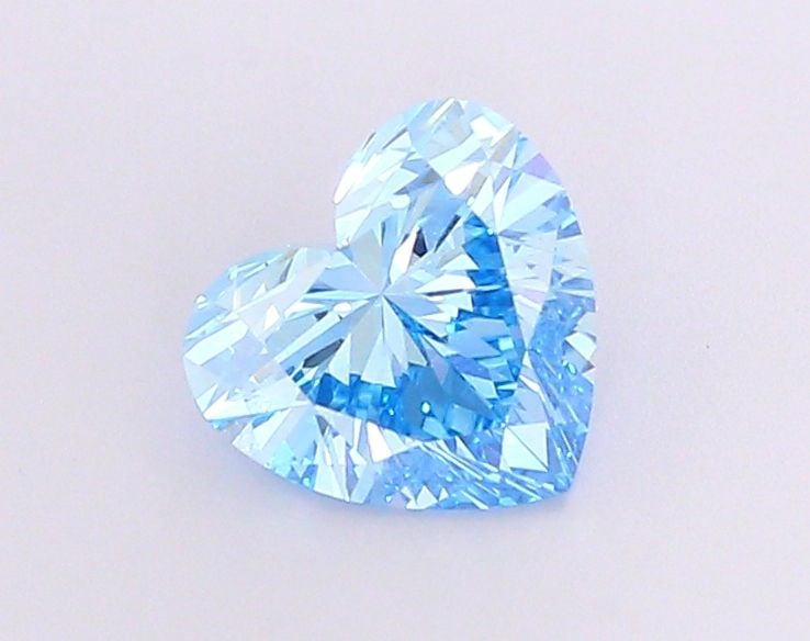 Loose Diamond - HEART 1.56ct Fancy Vivid Blue VS1: Loose Diamond - HEART 1.56ct Fancy Vivid Blue VS1 Source: This is a real non-mined Diamond that has been grown in a lab Shape: HEART Carats: 1.56 Color: Fancy Vivid Blue Certification: IGI Video: