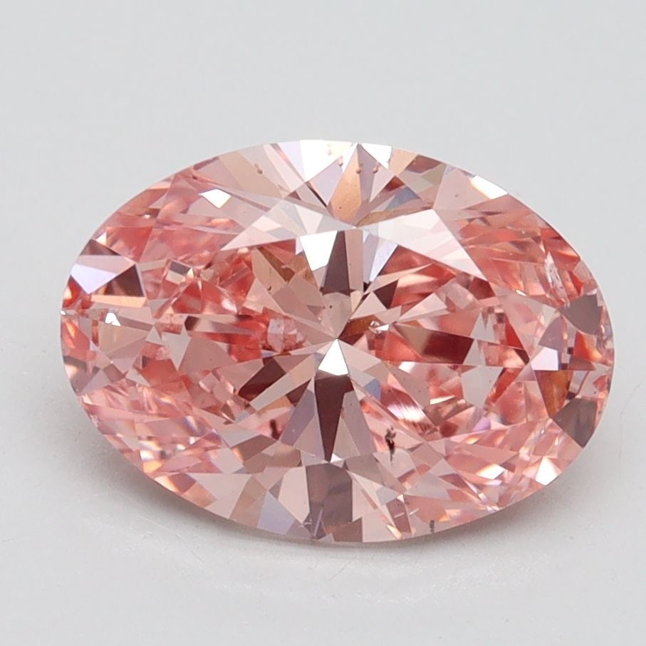 Loose Diamond - OVAL 2.3ct Fancy Vivid Pink SI1: Loose Diamond - OVAL 2.3ct Fancy Vivid Pink SI1 Source: This is a real non-mined Diamond that has been grown in a lab Shape: OVAL Carats: 2.3 Color: Fancy Vivid Pink Certification: IGI Video:
