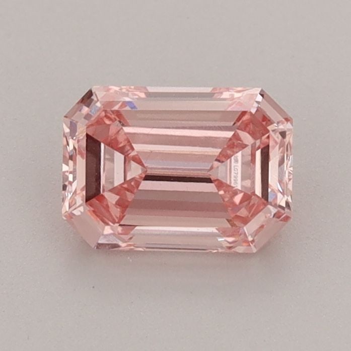 Loose Diamond - EMERALD 0.88ct Fancy Vivid Pink VS2: Loose Diamond - EMERALD 0.88ct Fancy Vivid Pink VS2 Source: This is a real non-mined Diamond that has been grown in a lab Shape: EMERALD Carats: 0.88 Color: Fancy Vivid Pink Certification: IGI Video: