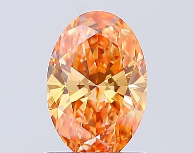 Loose Diamond - OVAL 1.05ct Fancy Vivid Pink Orange VS1: Loose Diamond - OVAL 1.05ct Fancy Vivid Pink Orange VS1 Source: This is a real non-mined Diamond that has been grown in a lab Shape: OVAL Carats: 1.05 Color: Fancy Vivid Pink Orange Certification: IGI