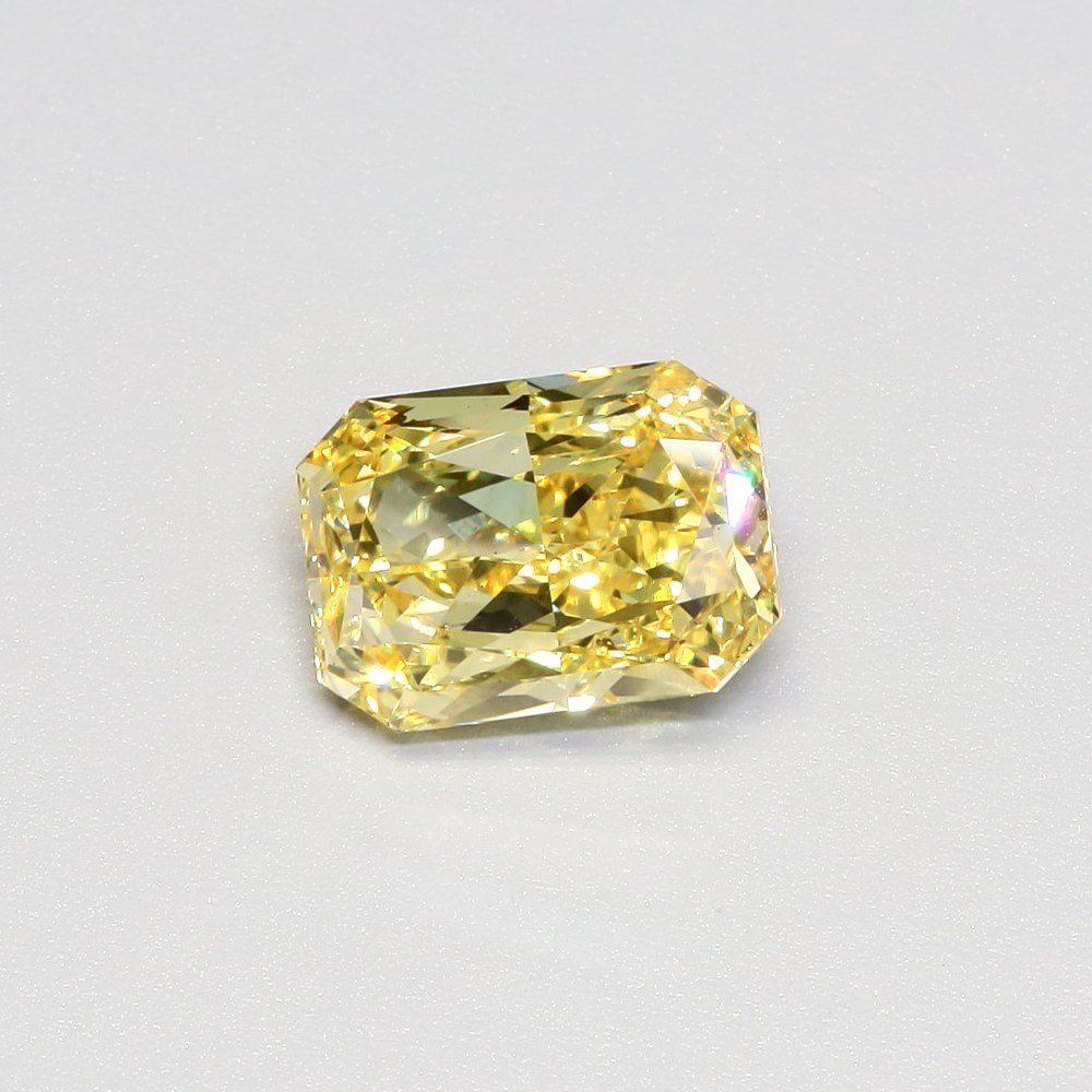 Loose Diamond - RADIANT 3.56ct Fancy Vivid Yellow VS2: Loose Diamond - RADIANT 3.56ct Fancy Vivid Yellow VS2 Source: This is a real non-mined Diamond that has been grown in a lab Shape: RADIANT Carats: 3.56 Color: Fancy Vivid Yellow Certification: IGI Vid