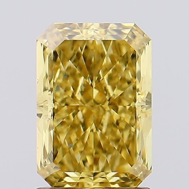 Loose Diamond - RADIANT 1.79ct Fancy Vivid Yellow VS1: Loose Diamond - RADIANT 1.79ct Fancy Vivid Yellow VS1 Source: This is a real non-mined Diamond that has been grown in a lab Shape: RADIANT Carats: 1.79 Color: Fancy Vivid Yellow Certification: IGI Vid