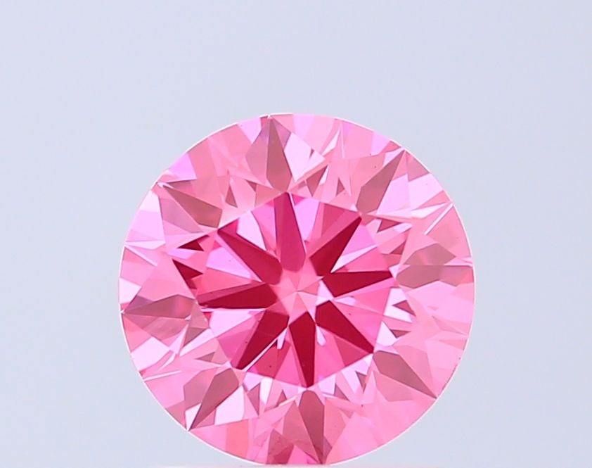 Ideal Loose Diamond - ROUND 1.5ct Fancy Vivid Pink VS1: Ideal Loose Diamond - ROUND 1.5ct Fancy Vivid Pink VS1 Source: This is a real non-mined Diamond that has been grown in a lab Shape: ROUND Carats: 1.5 Color: Fancy Vivid Pink Certification: IGI Video: