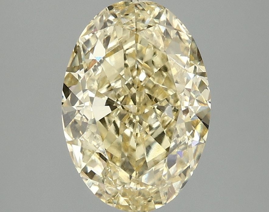 Loose Diamond - OVAL 3.0ct Fancy Vivid Yellow VS1: Loose Diamond - OVAL 3.0ct Fancy Vivid Yellow VS1 Source: This is a real non-mined Diamond that has been grown in a lab Shape: OVAL Carats: 3.0 Color: Fancy Vivid Yellow Certification: IGI Video: