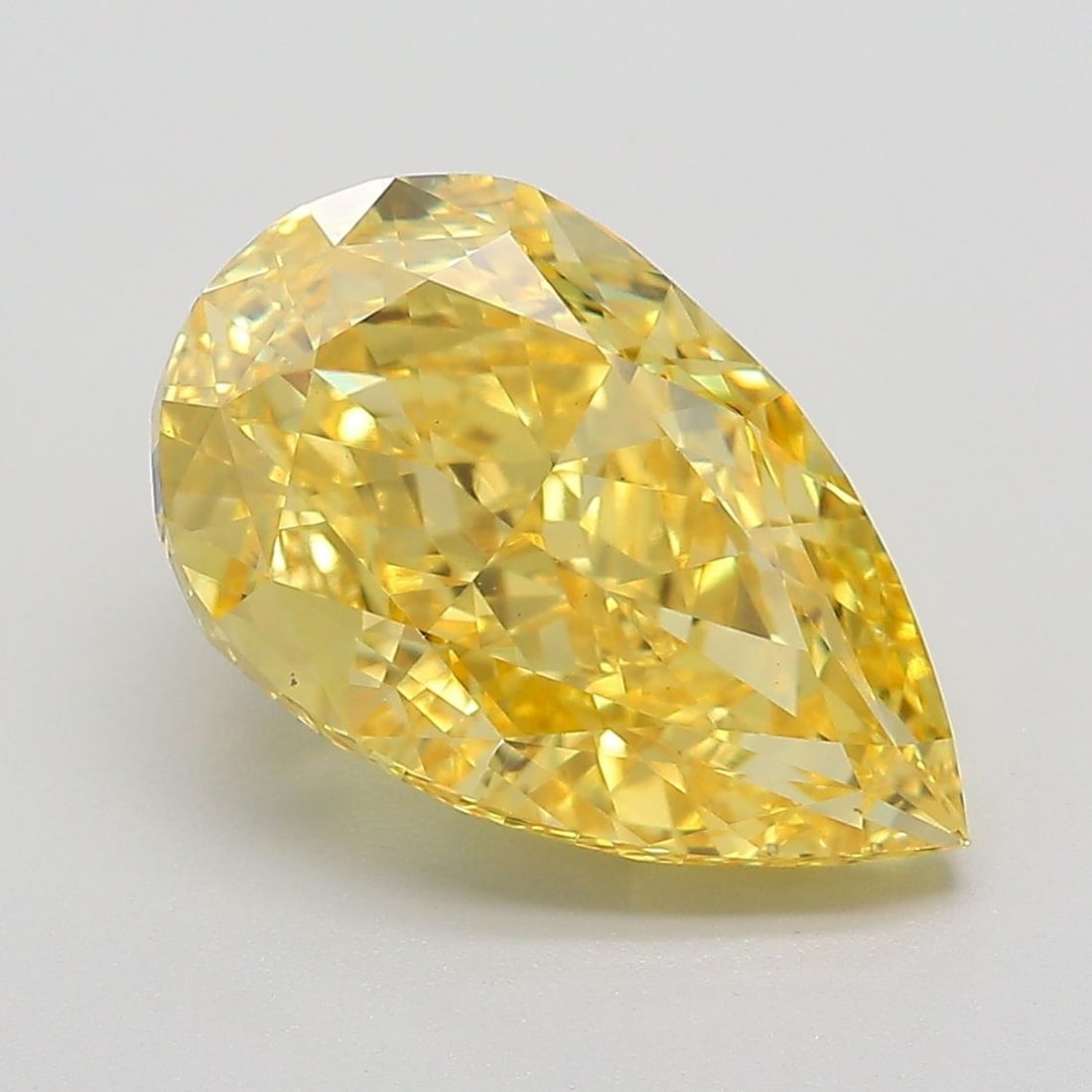 Loose Diamond - PEAR 5.07ct Fancy Vivid Yellow VS1: Loose Diamond - PEAR 5.07ct Fancy Vivid Yellow VS1 Source: This is a real non-mined Diamond that has been grown in a lab Shape: PEAR Carats: 5.07 Color: Fancy Vivid Yellow Certification: IGI Video: