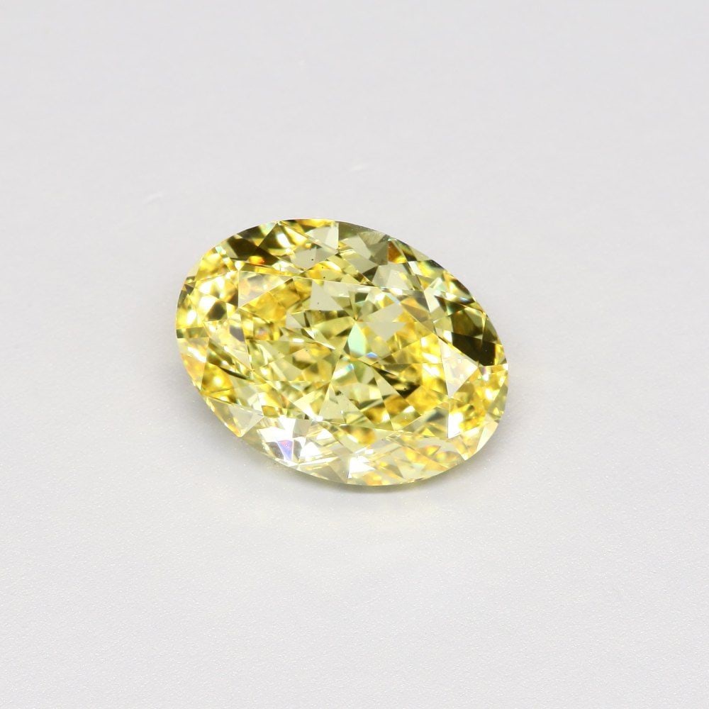 Loose Diamond - OVAL 5.01ct Fancy Vivid Yellow VS2: Loose Diamond - OVAL 5.01ct Fancy Vivid Yellow VS2 Source: This is a real non-mined Diamond that has been grown in a lab Shape: OVAL Carats: 5.01 Color: Fancy Vivid Yellow Certification: IGI Video: