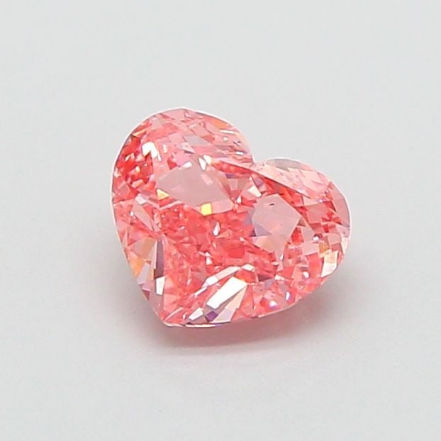 Loose Diamond - HEART 0.74ct Fancy Vivid Pink VS1: Loose Diamond - HEART 0.74ct Fancy Vivid Pink VS1 Source: This is a real non-mined Diamond that has been grown in a lab Shape: HEART Carats: 0.74 Color: Fancy Vivid Pink Certification: IGI Video: