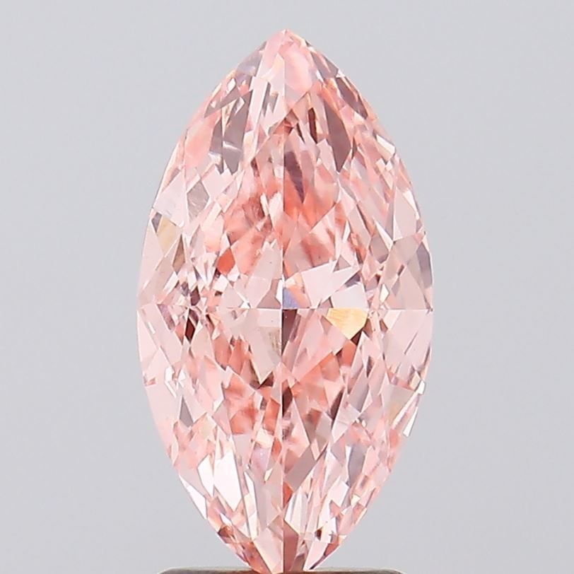 Loose Diamond - MARQUISE 2.73ct Fancy Vivid Pink VVS2: Loose Diamond - MARQUISE 2.73ct Fancy Vivid Pink VVS2 Source: This is a real non-mined Diamond that has been grown in a lab Shape: MARQUISE Carats: 2.73 Color: Fancy Vivid Pink Certification: IGI Vide
