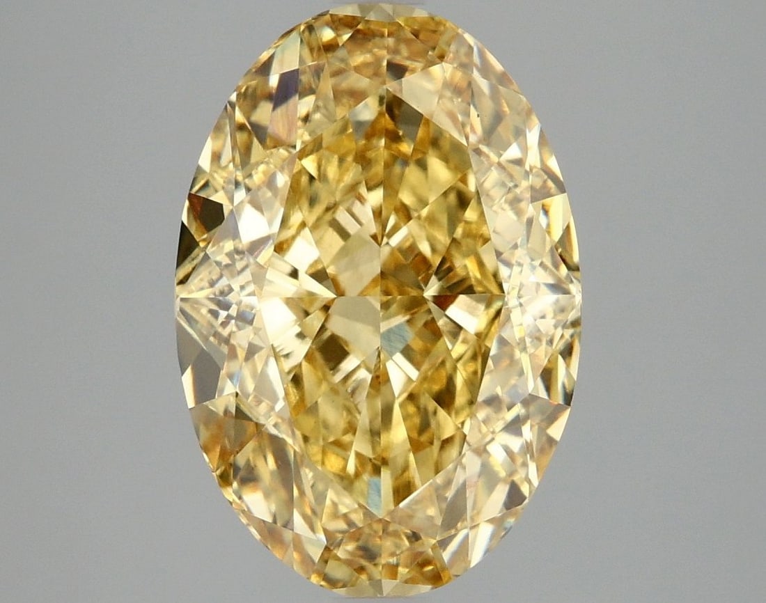 Loose Diamond - OVAL 5.07ct Fancy Vivid Yellow VS1: Loose Diamond - OVAL 5.07ct Fancy Vivid Yellow VS1 Source: This is a real non-mined Diamond that has been grown in a lab Shape: OVAL Carats: 5.07 Color: Fancy Vivid Yellow Certification: IGI Video: