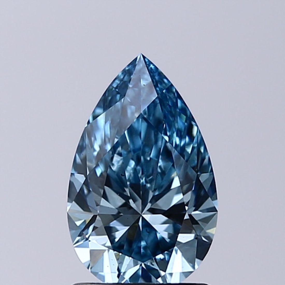 Loose Diamond - PEAR 1.23ct Fancy Vivid Blue VS2: Loose Diamond - PEAR 1.23ct Fancy Vivid Blue VS2 Source: This is a real non-mined Diamond that has been grown in a lab Shape: PEAR Carats: 1.23 Color: Fancy Vivid Blue Certification: IGI Video: