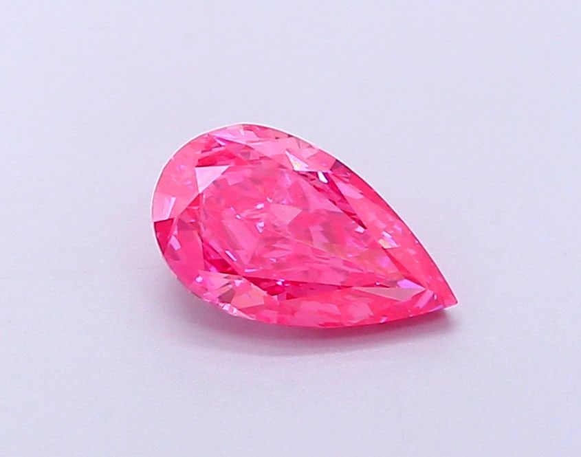 Loose Diamond - PEAR 1.03ct Fancy Vivid Pink VS1: Loose Diamond - PEAR 1.03ct Fancy Vivid Pink VS1 Source: This is a real non-mined Diamond that has been grown in a lab Shape: PEAR Carats: 1.03 Color: Fancy Vivid Pink Certification: IGI Video: