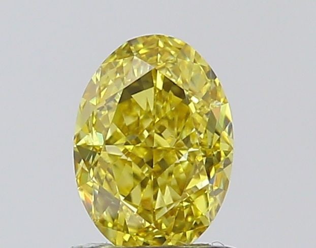 Loose Diamond - OVAL 1.02ct Fancy Intense Yellow VVS2: Loose Diamond - OVAL 1.02ct Fancy Intense Yellow VVS2 Source: This is a real non-mined Diamond that has been grown in a lab Shape: OVAL Carats: 1.02 Color: Fancy Intense Yellow Certification: IGI Vide