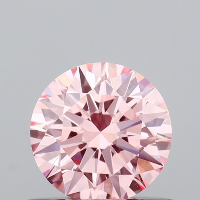 Loose Diamond - ROUND 0.54ct Fancy Vivid Pink VVS1: Loose Diamond - ROUND 0.54ct Fancy Vivid Pink VVS1 Source: This is a real non-mined Diamond that has been grown in a lab Shape: ROUND Carats: 0.54 Color: Fancy Vivid Pink Certification: IGI Video: