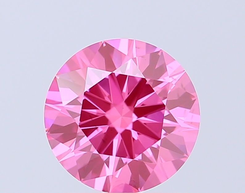 Loose Diamond - ROUND 1.4ct Fancy Vivid Pink SI1: Loose Diamond - ROUND 1.4ct Fancy Vivid Pink SI1 Source: This is a real non-mined Diamond that has been grown in a lab Shape: ROUND Carats: 1.4 Color: Fancy Vivid Pink Certification: IGI Video: