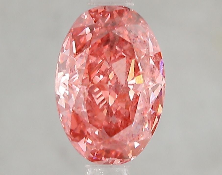 Loose Diamond - OVAL 2.03ct Fancy Vivid Pink SI1: Loose Diamond - OVAL 2.03ct Fancy Vivid Pink SI1 Source: This is a real non-mined Diamond that has been grown in a lab Shape: OVAL Carats: 2.03 Color: Fancy Vivid Pink Certification: IGI Video: