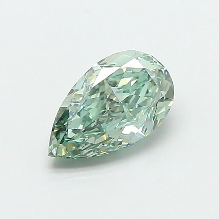 Loose Diamond - PEAR 1.03ct Fancy Vivid Green VVS2: Loose Diamond - PEAR 1.03ct Fancy Vivid Green VVS2 Source: This is a real non-mined Diamond that has been grown in a lab Shape: PEAR Carats: 1.03 Color: Fancy Vivid Green Certification: IGI Video:
