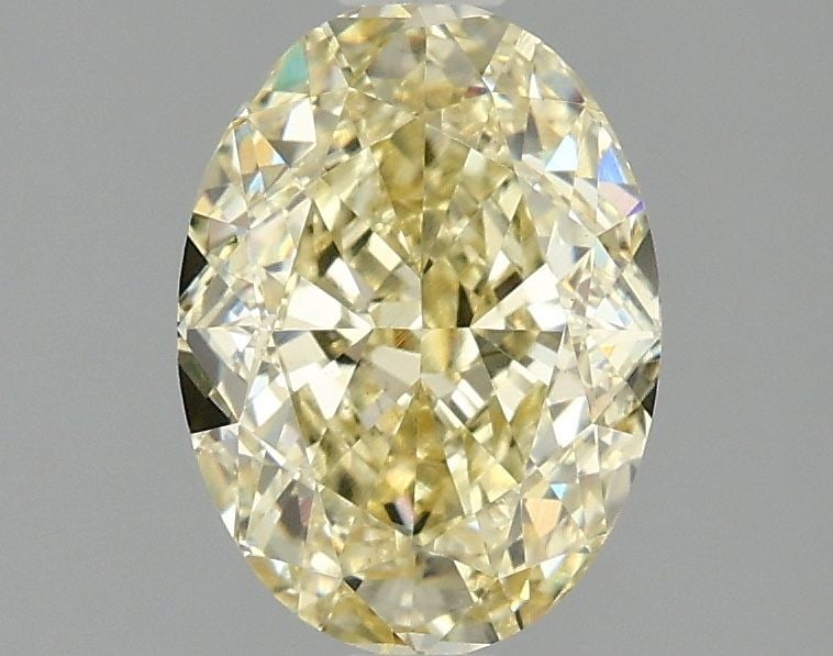 Loose Diamond - OVAL 2.08ct Fancy Intense Yellow VVS2: Loose Diamond - OVAL 2.08ct Fancy Intense Yellow VVS2 Source: This is a real non-mined Diamond that has been grown in a lab Shape: OVAL Carats: 2.08 Color: Fancy Intense Yellow Certification: IGI Vide