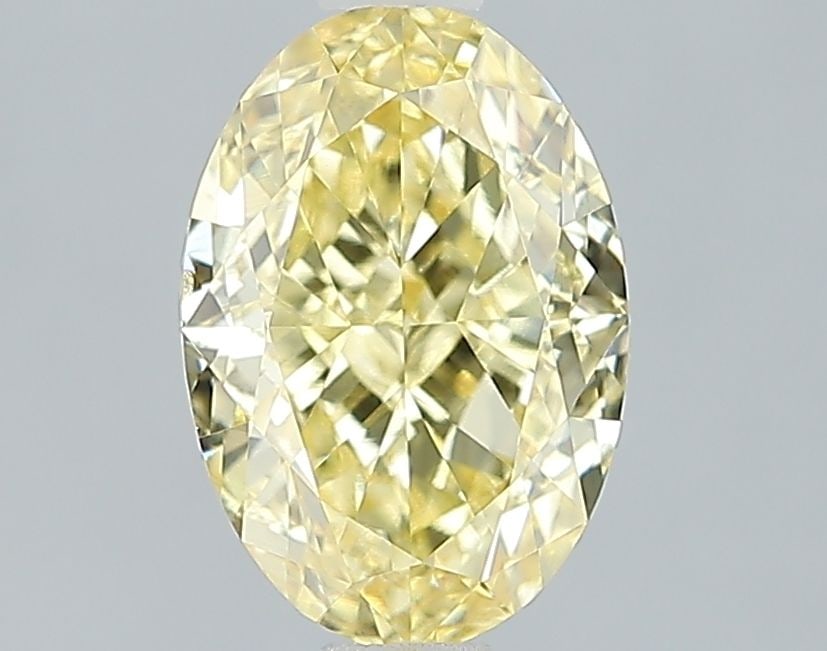 Loose Diamond - OVAL 2.31ct Fancy Vivid Yellow VS2: Loose Diamond - OVAL 2.31ct Fancy Vivid Yellow VS2 Source: This is a real non-mined Diamond that has been grown in a lab Shape: OVAL Carats: 2.31 Color: Fancy Vivid Yellow Certification: IGI Video: