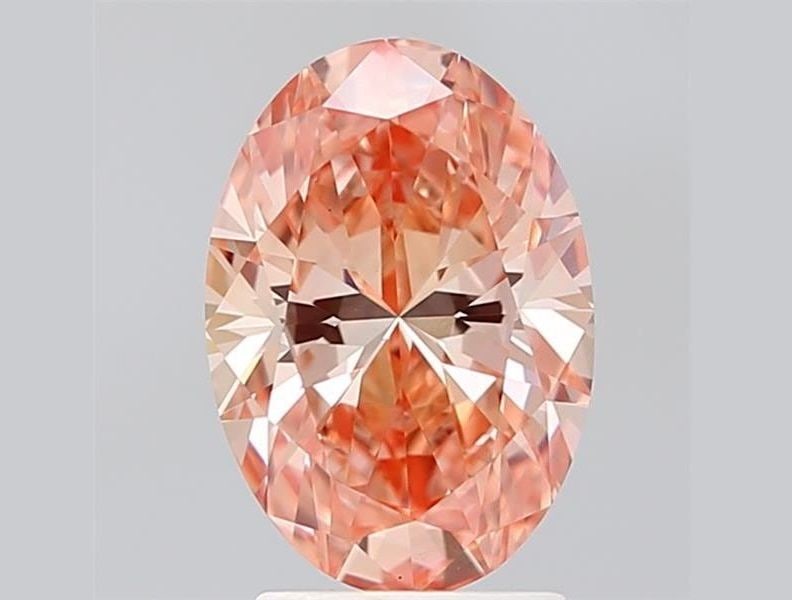 Loose Diamond - OVAL 2.42ct Fancy Vivid Orangey Pink VS1: Loose Diamond - OVAL 2.42ct Fancy Vivid Orangey Pink VS1 Source: This is a real non-mined Diamond that has been grown in a lab Shape: OVAL Carats: 2.42 Color: Fancy Vivid Orangey Pink Certification: I