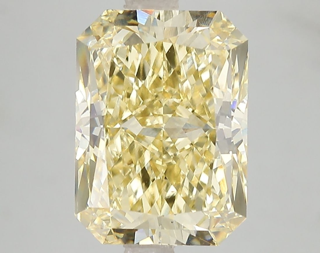 Loose Diamond - RADIANT 5.04ct Fancy Vivid Yellow VS1: Loose Diamond - RADIANT 5.04ct Fancy Vivid Yellow VS1 Source: This is a real non-mined Diamond that has been grown in a lab Shape: RADIANT Carats: 5.04 Color: Fancy Vivid Yellow Certification: IGI Vid