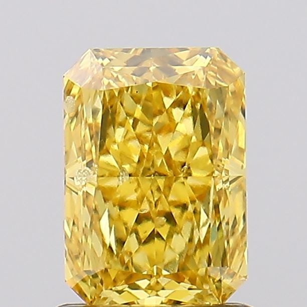 Loose Diamond - RADIANT 1.06ct Fancy Vivid Yellow SI2: Loose Diamond - RADIANT 1.06ct Fancy Vivid Yellow SI2 Source: This is a real non-mined Diamond that has been grown in a lab Shape: RADIANT Carats: 1.06 Color: Fancy Vivid Yellow Certification: IGI Vid