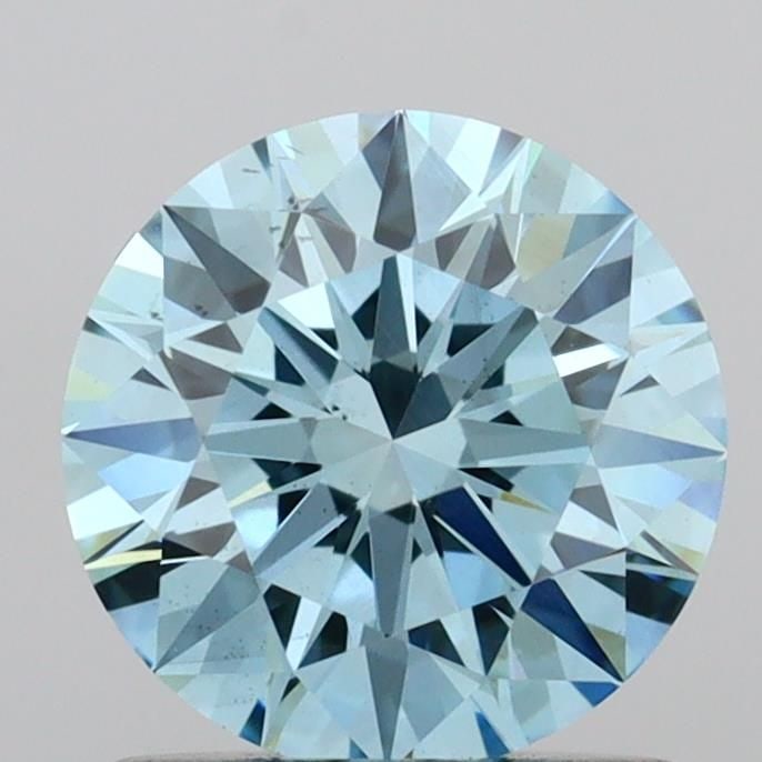 Ideal Loose Diamond - ROUND 1.03ct Fancy Vivid Blue VS2: Ideal Loose Diamond - ROUND 1.03ct Fancy Vivid Blue VS2 Source: This is a real non-mined Diamond that has been grown in a lab Shape: ROUND Carats: 1.03 Color: Fancy Vivid Blue Certification: IGI Video