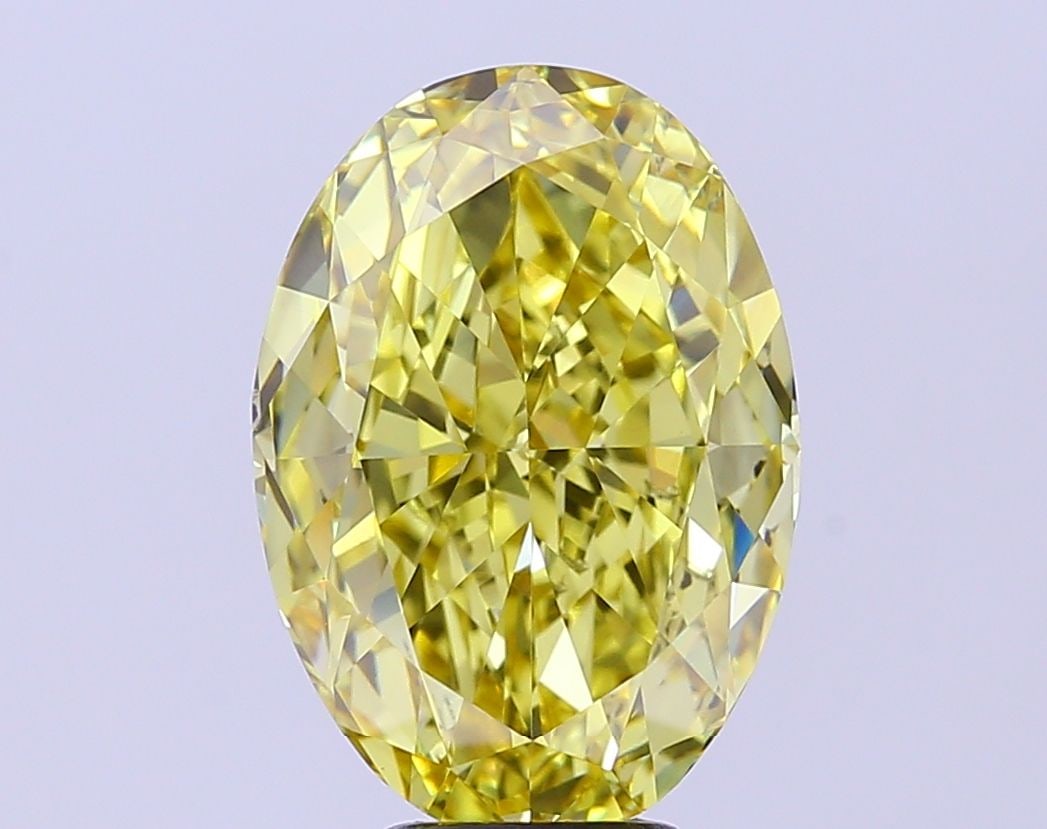 Loose Diamond - OVAL 7.01ct Fancy Vivid Yellow VS1: Loose Diamond - OVAL 7.01ct Fancy Vivid Yellow VS1 Source: This is a real non-mined Diamond that has been grown in a lab Shape: OVAL Carats: 7.01 Color: Fancy Vivid Yellow Certification: IGI Video: