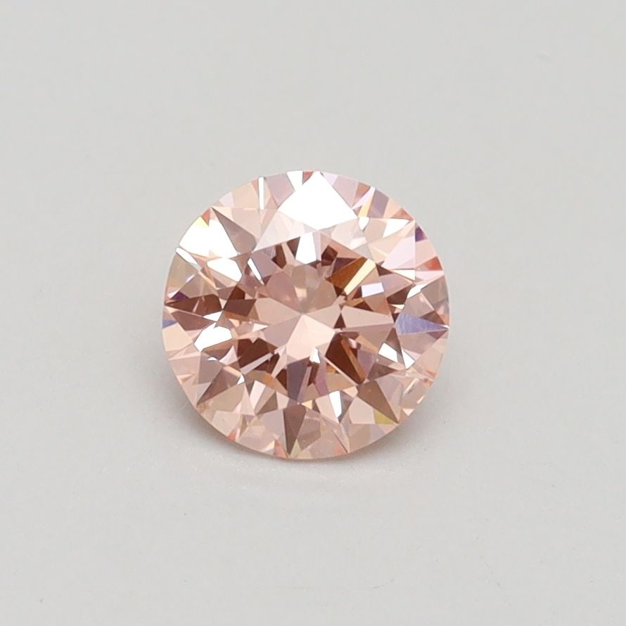 Loose Diamond - ROUND 0.6ct Fancy Intense Pink VS2: Loose Diamond - ROUND 0.6ct Fancy Intense Pink VS2 Source: This is a real non-mined Diamond that has been grown in a lab Shape: ROUND Carats: 0.6 Color: Fancy Intense Pink Certification: IGI Video: