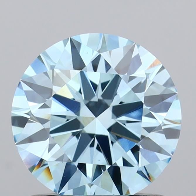 Ideal Loose Diamond - ROUND 1.04ct Fancy Vivid Blue VS1: Ideal Loose Diamond - ROUND 1.04ct Fancy Vivid Blue VS1 Source: This is a real non-mined Diamond that has been grown in a lab Shape: ROUND Carats: 1.04 Color: Fancy Vivid Blue Certification: IGI Video